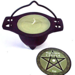 Sage candle in cauldron